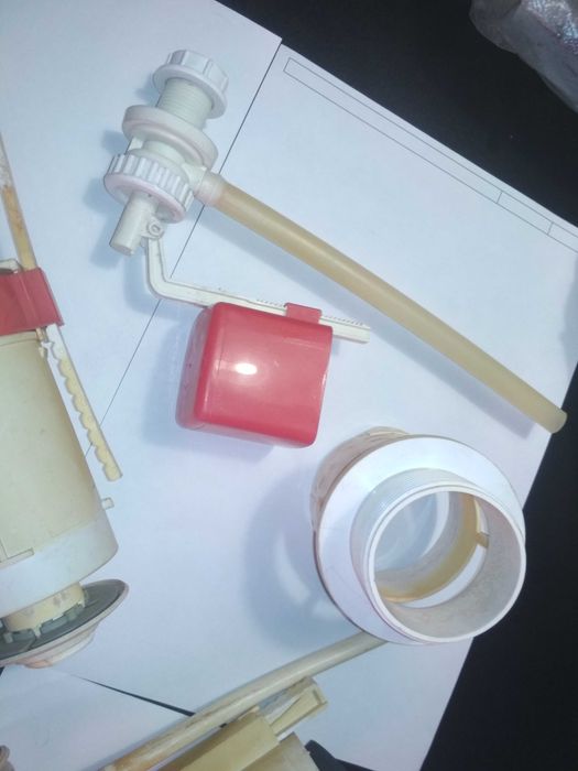 Продам Арматуру для унитаза с запчастями бу и новые детали. Два вида