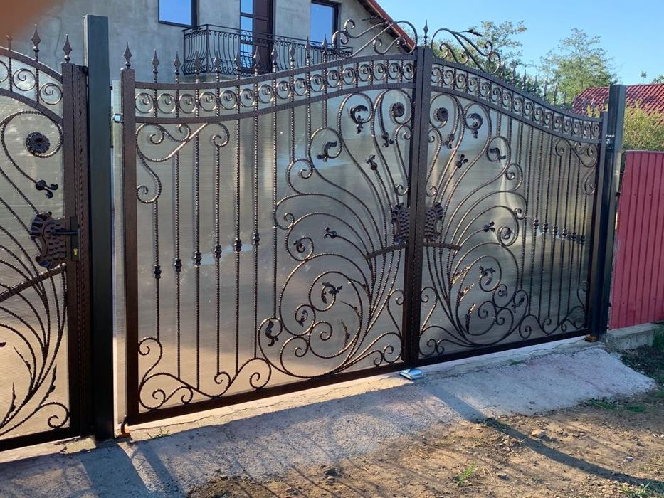 Porți,garduri,copertine ,scări din fier forjat