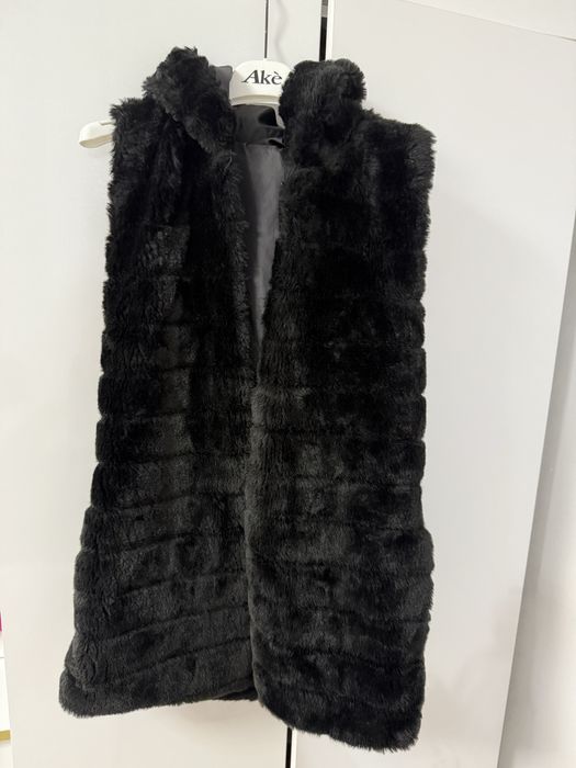 Vesta de blana .