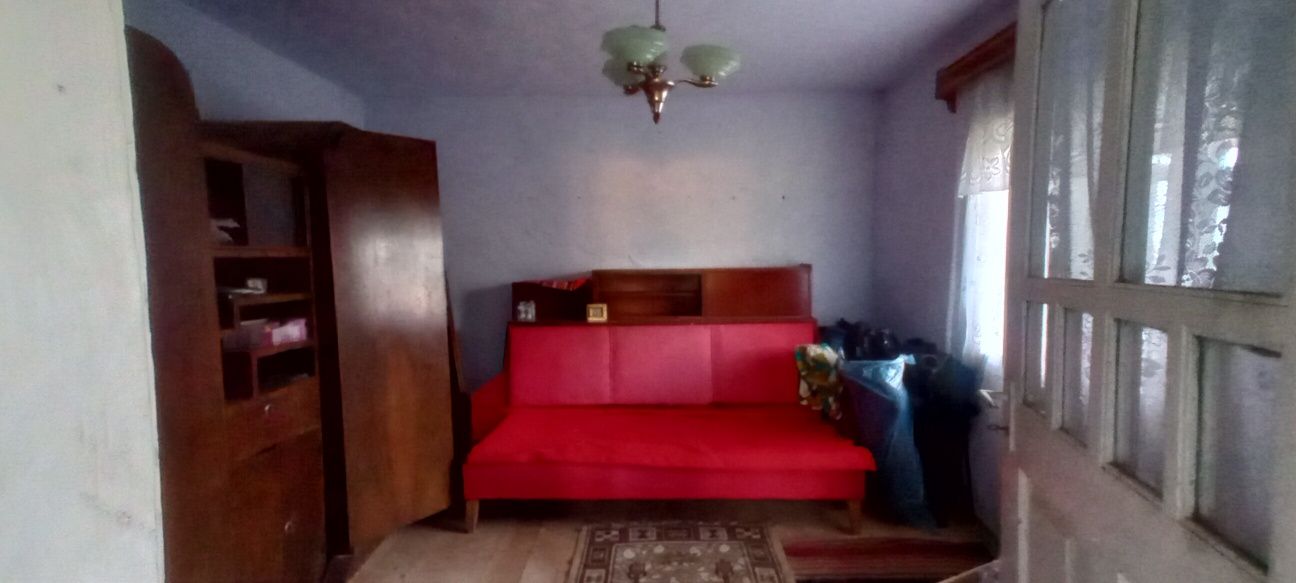 Teren in Malini cu casa bătrânească