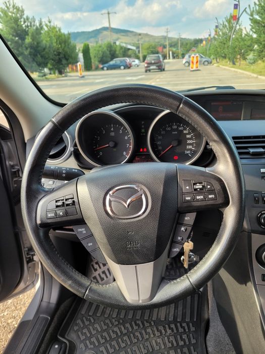 Mazda 3  Exclusive benzina/ cutie automată