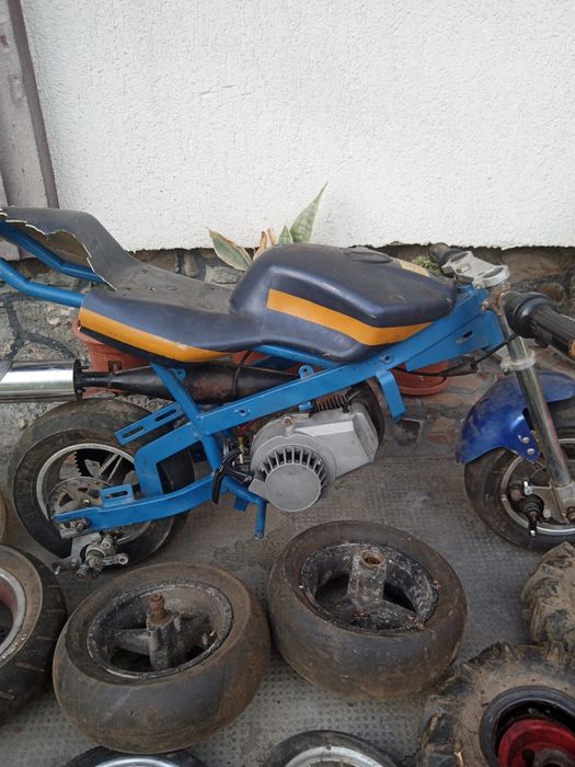 Moto copii cu motor original în stare bună de funcționare+ roți de sch