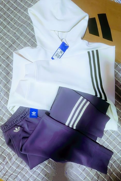 Обалденный оригинальный  костюм Адидас новый с Дубай