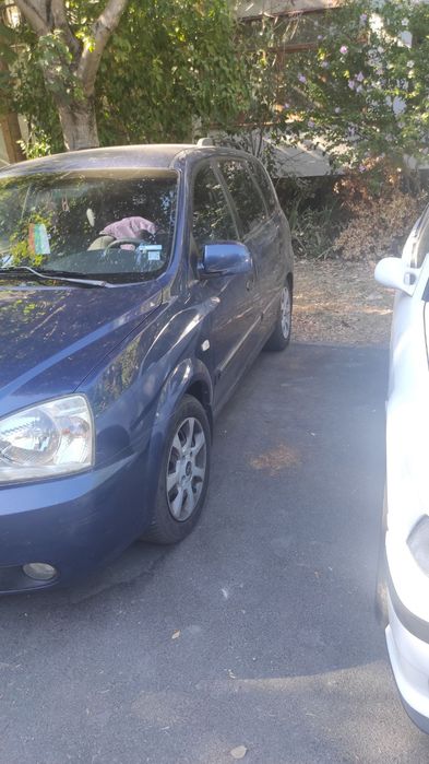 Kia  Carens с газова уредба