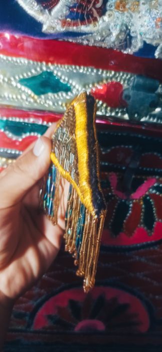 Qoʻlda yasalgan milliy tumor(zardozlik,bonchuklik bezak)