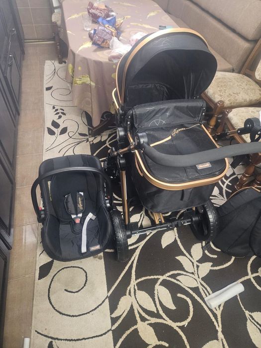 Vând cărucior și scoică