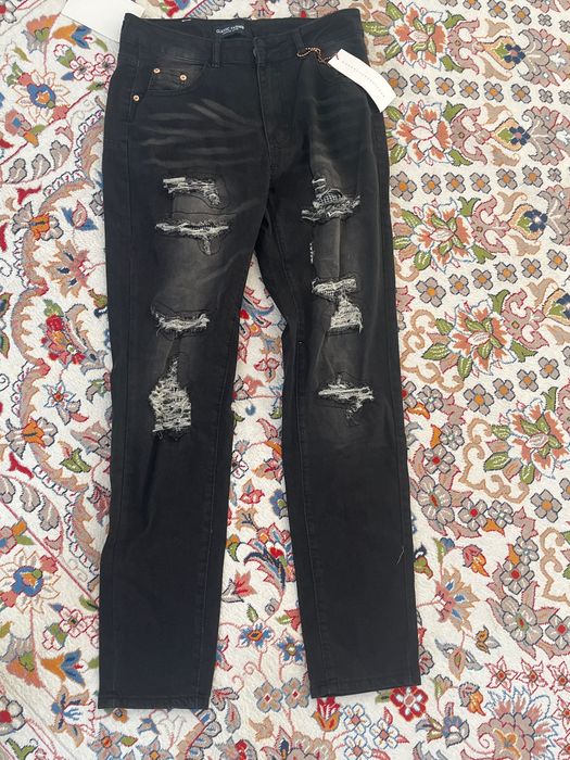 Джинсы черные рваные