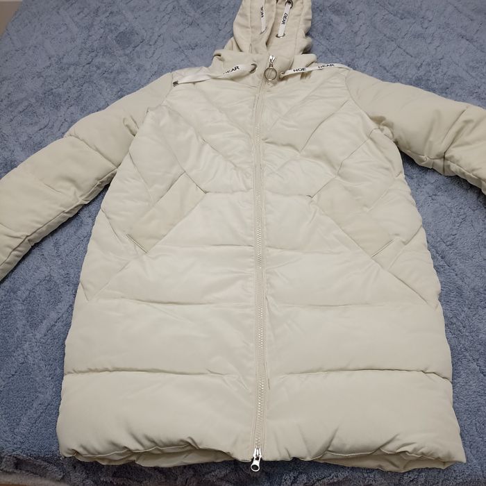 Продам зимнюю куртку новая