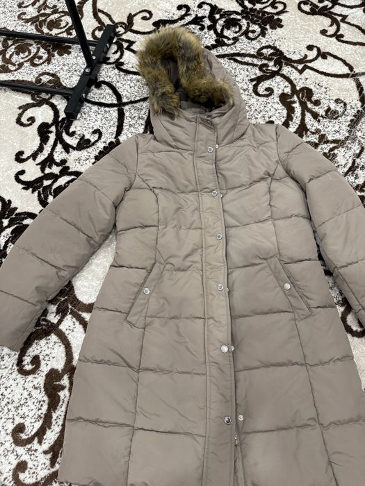 Продам женский пуховик. Новый. 35000т