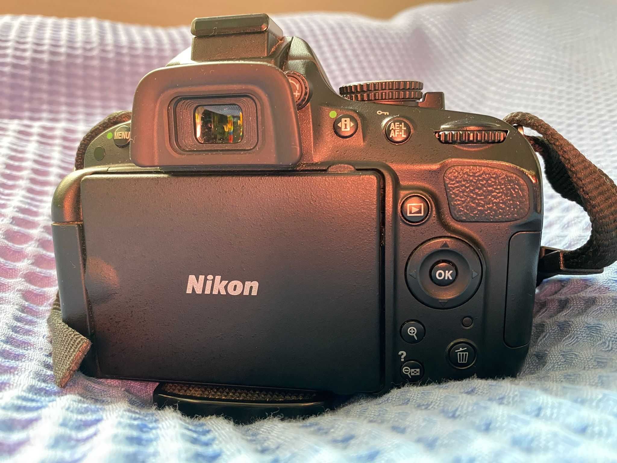 Nikon D5100 + AF-S NIKKOR 18-140mm