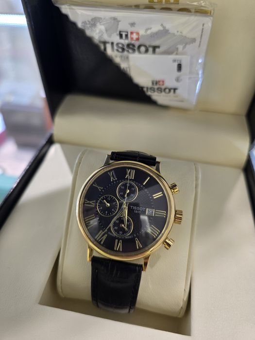 Продам Золотые часы Tissot 750 пробы.