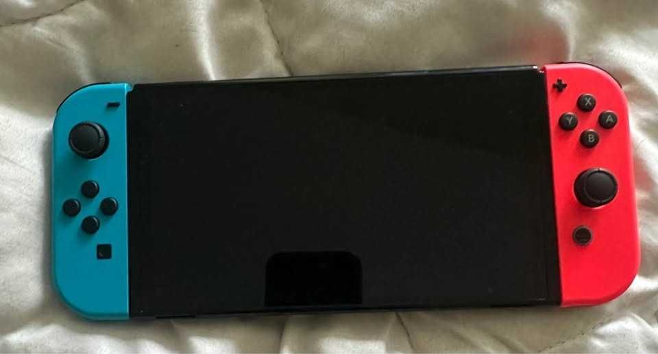 Nintendo switch OLED 64GB new