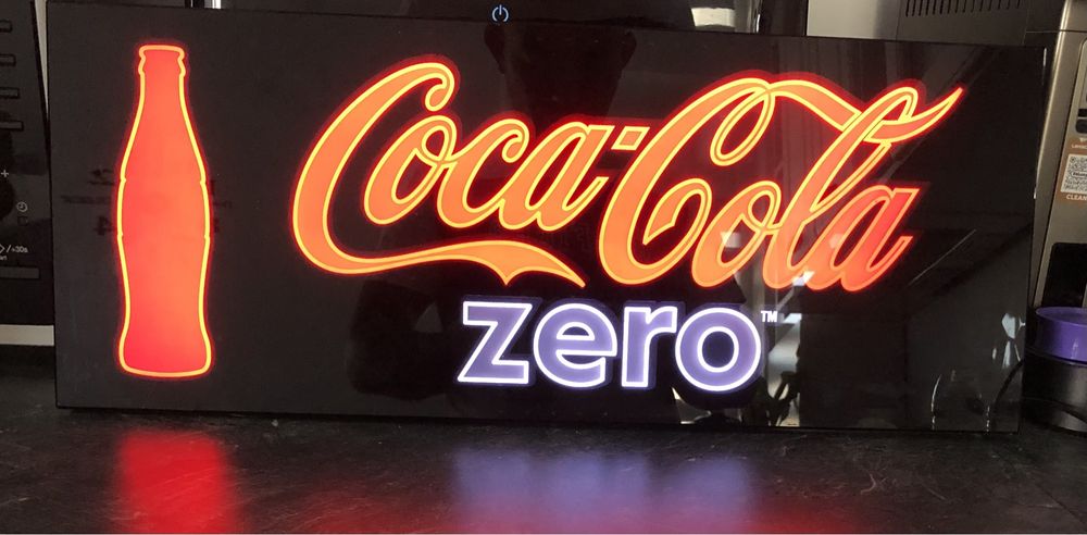 reclama luminoasa coca cola