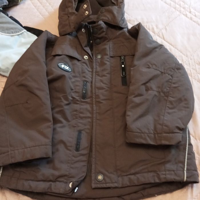 Детско яке дължината се вижда на рулетката.