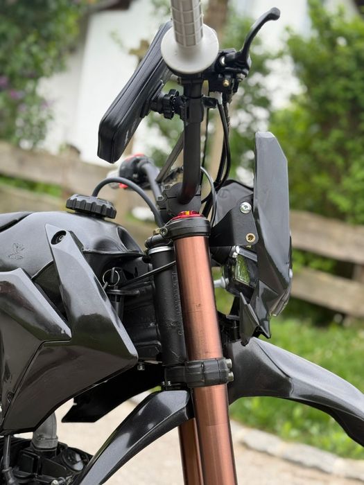 Vand cross 125 cc precizez ca motorul este in germania