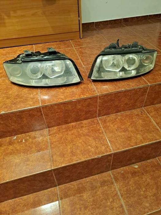 Far stanga dreapta Audi A4 B6 originale