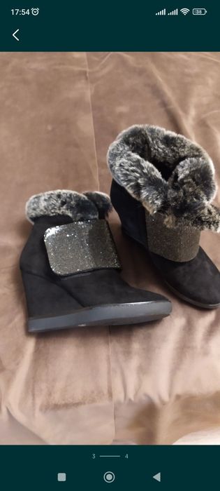 Продам зимние ботинки