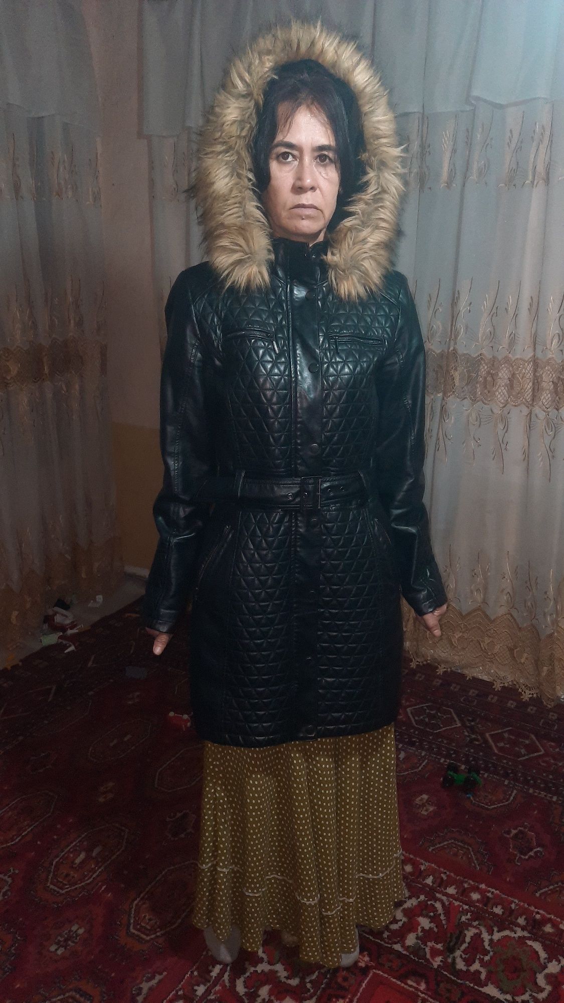 Кожаное пальто с мехом