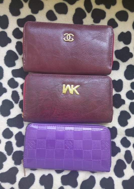 Portofele noi Chanel Louis Vuitton  și Michael Kors