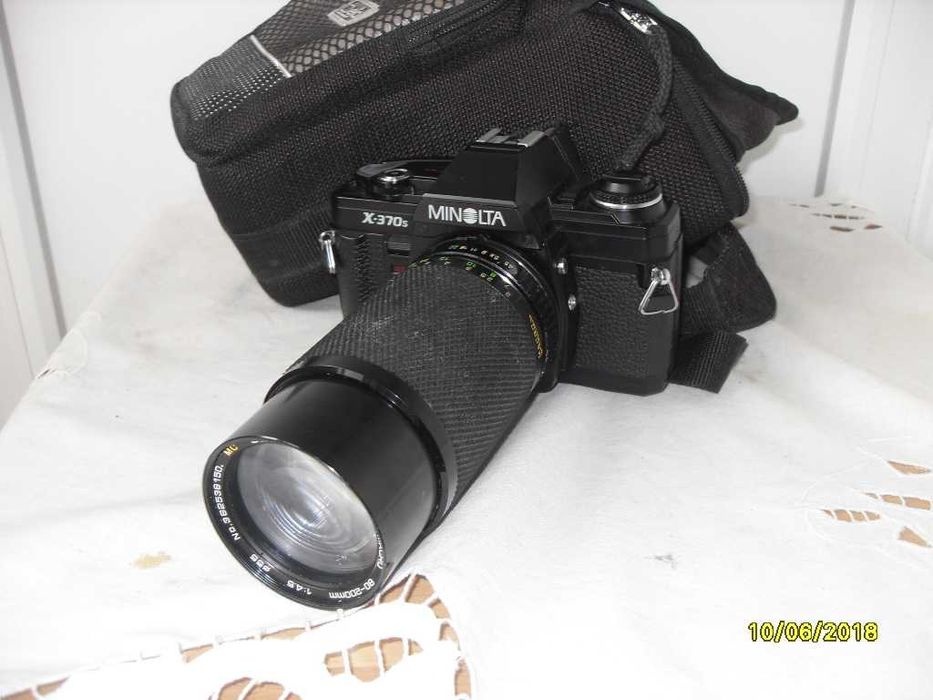 "Aparat foto  minolta X 370s cu teleobiectiv/macro soligor  
"