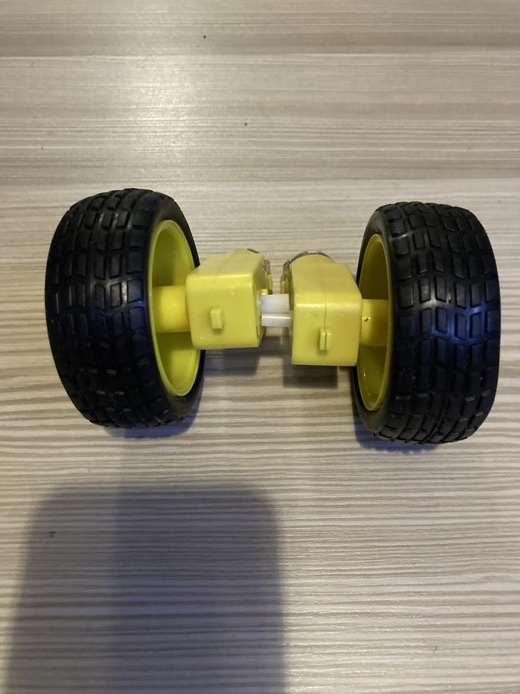 Motor c.c. cu roata pentru masini-jucarie 56mm diametru