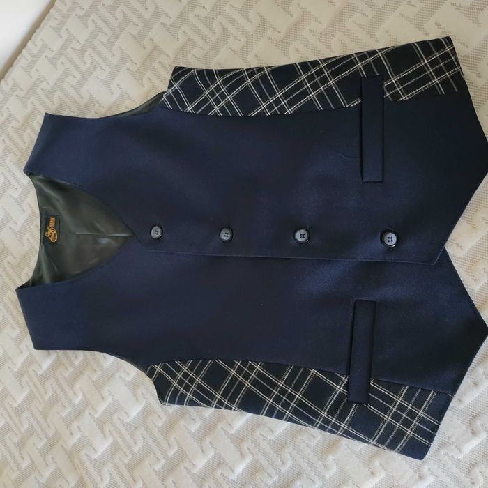 Продам жилетку новую