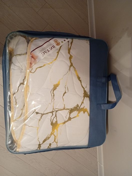 Продам одеяло двухспальное