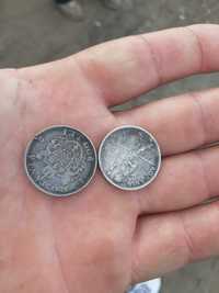 Monede un leu și 200 lei argint
