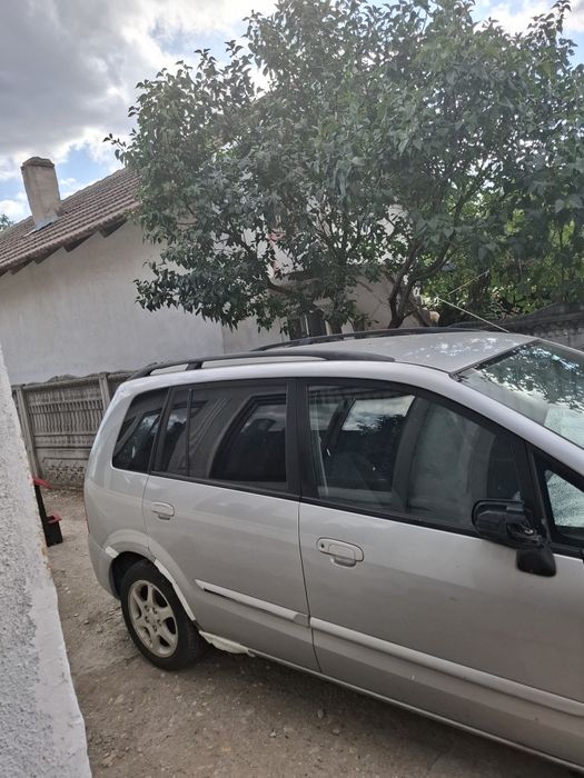 Vând Mazda primacy fabricație 2005proveniența Germania