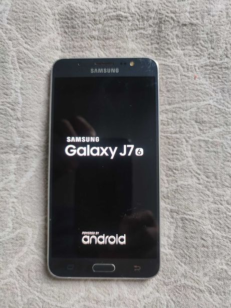 Мобильный телефон Samsung J7
