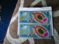 Bancnota de 2000lei cu eclipsa serie rara 001A