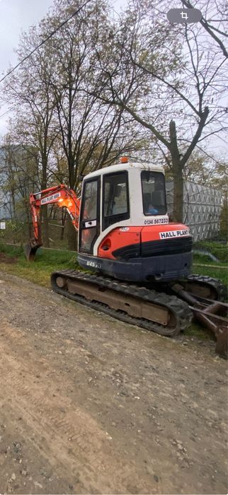 Buldoexcavator Excavator Bobcat de închiriat