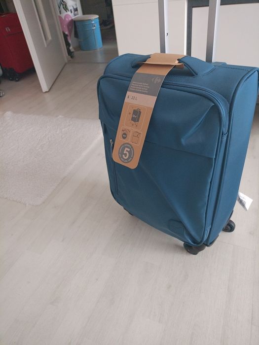 Vând troler material textil dimensiune de 54 cm nou nouț, produs de ca