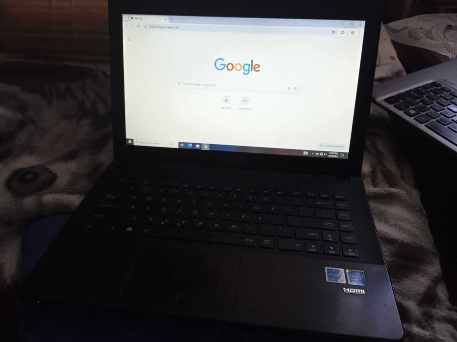 Vand laptop Asus