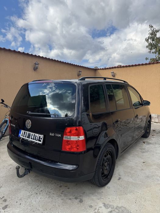 VW TOURAN ,fara rugina,usor negociabil,recent inmatriculata
