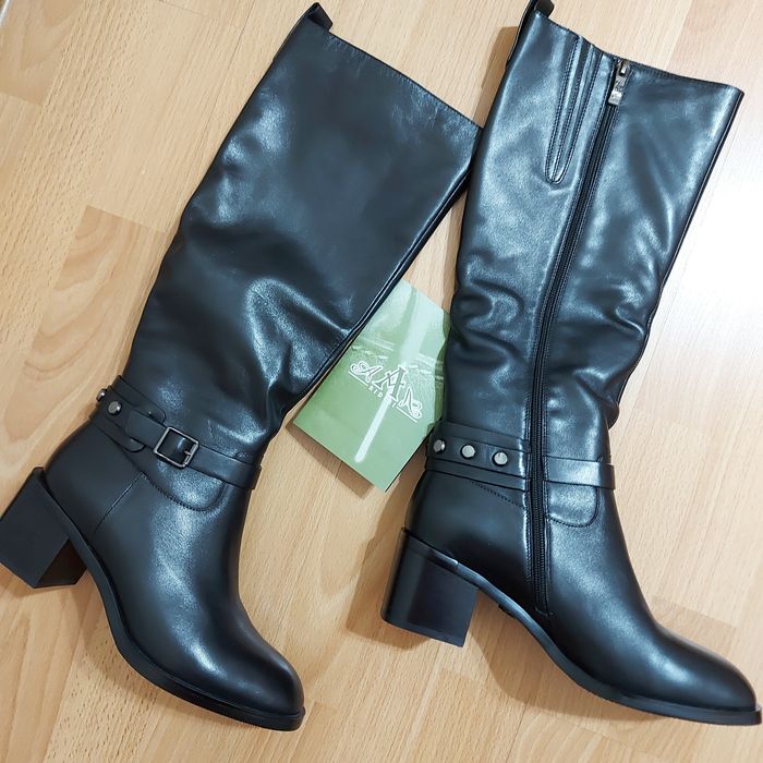 Продам сапоги новые