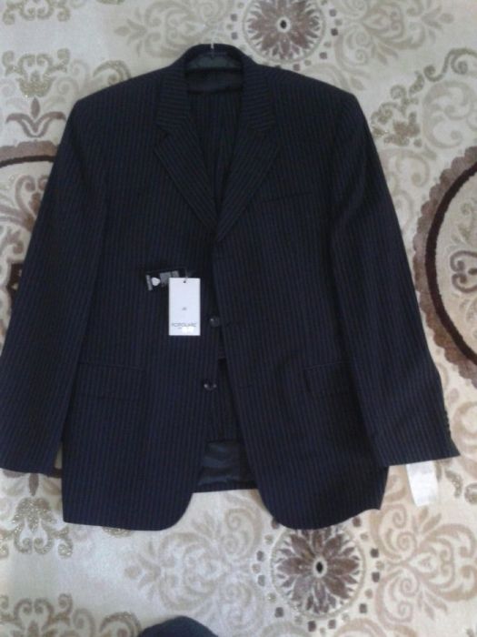 Продам новый костюм турецкий