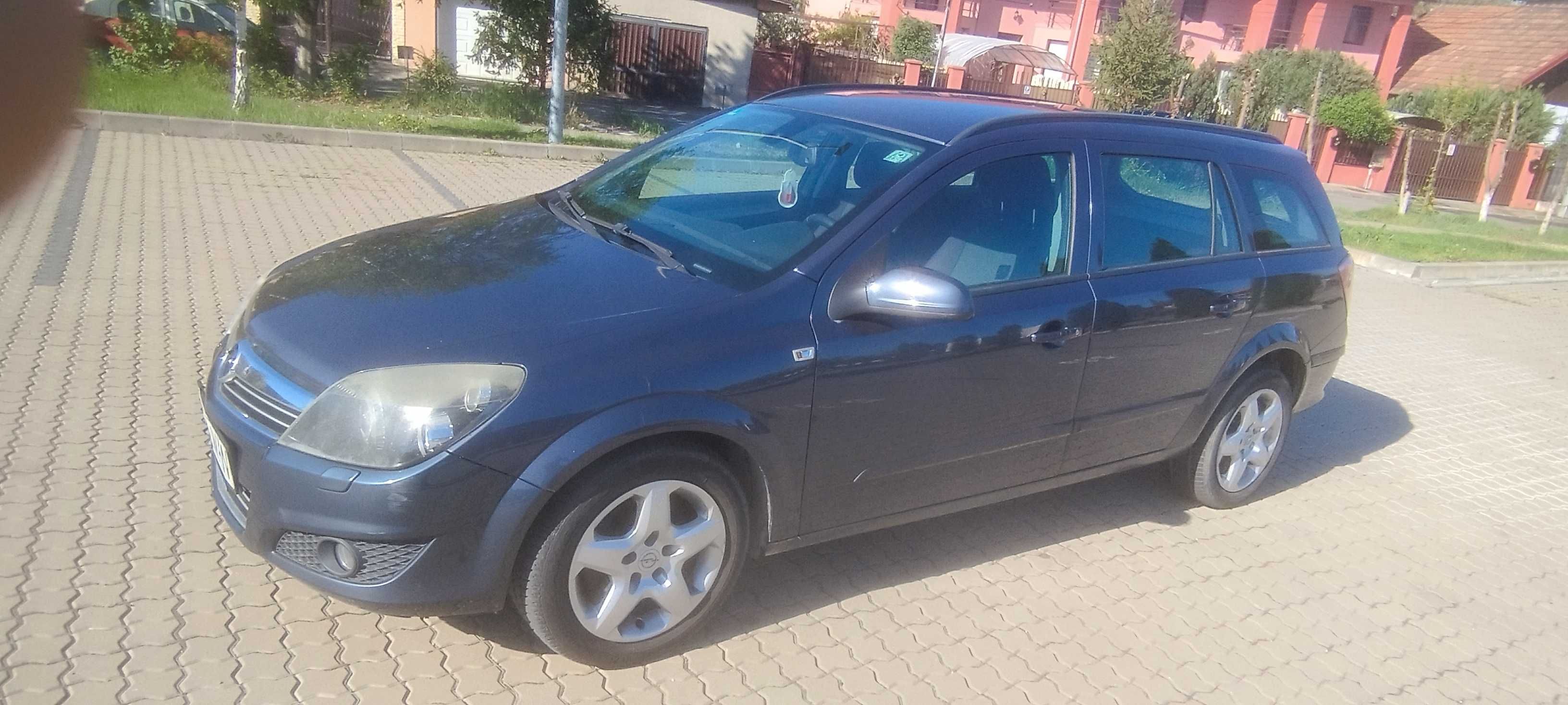 Opel Astra H combi 1,7 cdti 2009 ,xenon afl,senzor lumina ,ploaie.