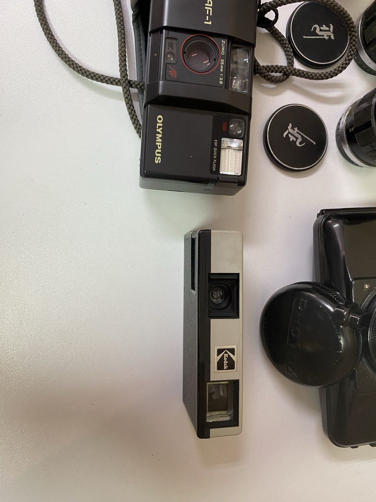Стари фотоапарати и обективи OLYMPUS
