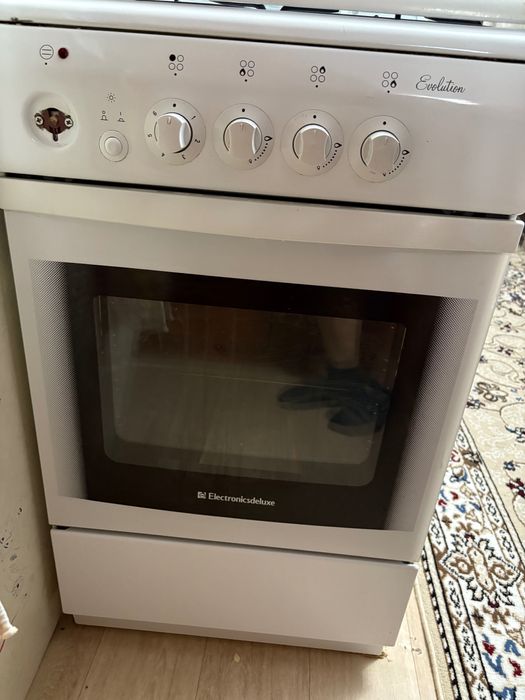 Газовая плита с духовкой