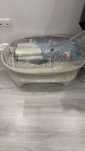 Pat bebeluș 4moms MamaRoo Sleep Bassinet