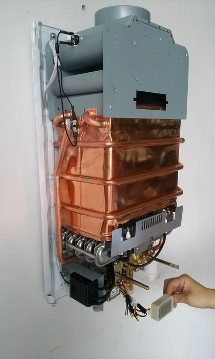 Ремонт установка чистка газ колонок настенных котлов  промывка  теплоо