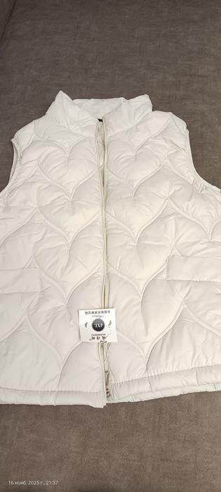 Продам Новую жилетку Женскую