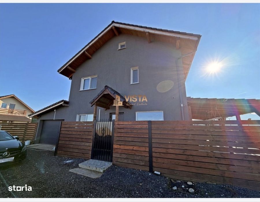 Casa individuala de vanzare ,4 cam ,900 mp teren . Izvor
