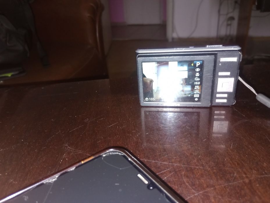 Olympus X-940, 14 MP, 4x optical zoom, digitală