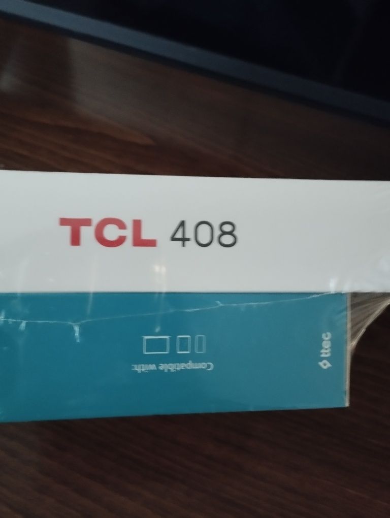 Продава се нов телефон TCL 408