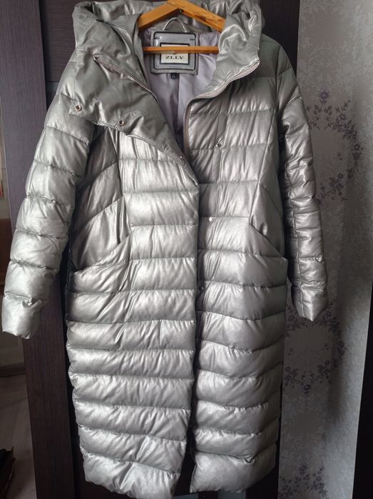 Продам пуховик новый