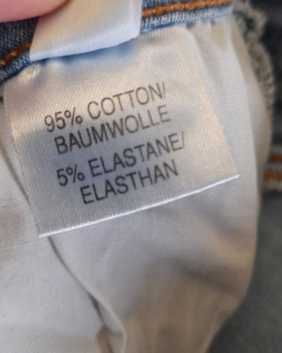 Blugi elastici cu capse