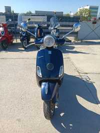 Скутер Vespa lx50