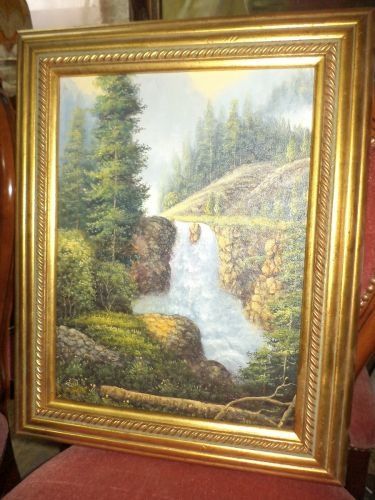Ulei pe panza peisaj montan,cascada cu o rama din lemn foitata o lucra
